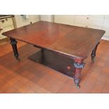 * A Victorian mahogany extending dining table, the moulded rectangular top with rounded corners,