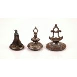 A selection of three 19th century white metal seal fobs, to include a carnelian intaglio example,