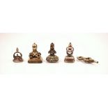 A selection of four late 19th century seal fobs, to include a rectangular carnelian set seal fob,