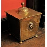 * A Regency style brass coal box, the square cover with spherical finial upon a fluted dome, over
