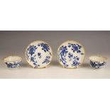 A pair of German hard paste porcelain blue and white tea bowls and saucers, late 18th century,