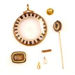 A selection of jewellery, to include a yellow metal and painted circular pendant/locket, the