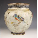 A glazed stoneware jardiniere, late 19th century, of compressed ovoid form with raised flared