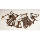 A collection of 17th century and later iron door and furniture keys, the longest 13cm (30)