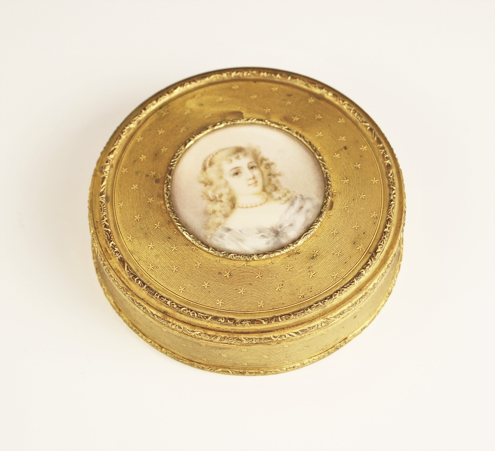 A French gilt brass circular powder box, late 19th century,