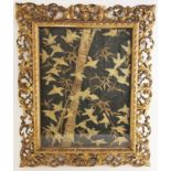 A large Japanese silk work embroidered panel, 19th century, depicting an abundance of birds in