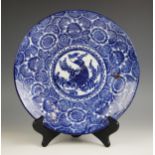 A Japanese porcelain blue and white charger, Meiji period (1868-1912) of shallow circular form and