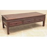 A Chinese rosewood kang/coffee table, late 20th century, the rectangular panelled top