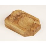 Workshop of Robert "Mouseman" Thompson of Kilburn, an oak ashtray of rectangular form with canted