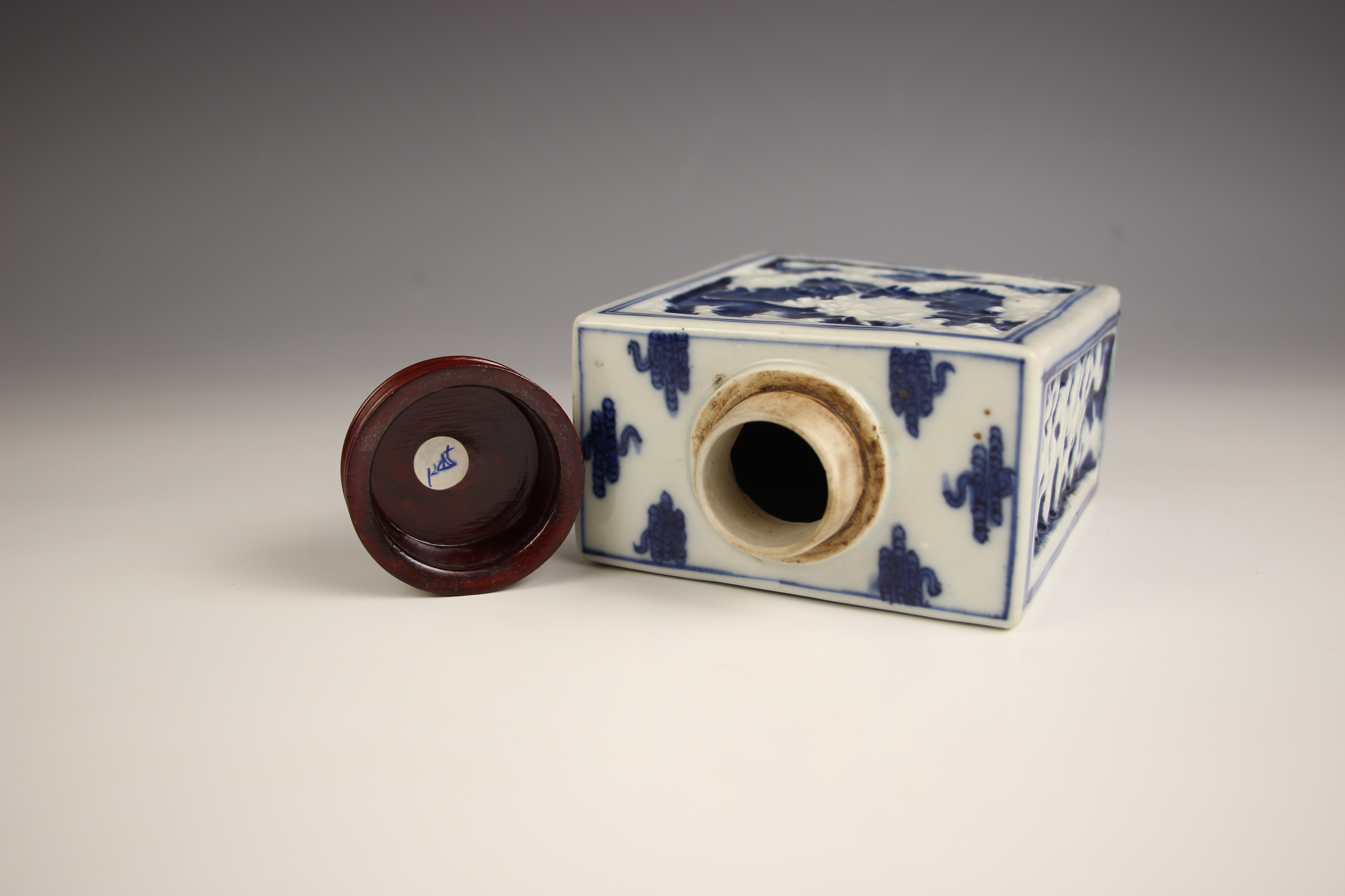 A Chinese porcelain blue and white tea caddy, 18th century, of rectangular form and relief decorated - Image 7 of 7