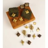 A collection of military buttons and badges, including two 'Shropshire Yeomanry' badges, seven '