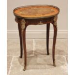 A French Louis XV style walnut and marquetry occasional table, mid 20th century, the book veneered