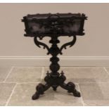 A Black Forest carved jardinere/plant stand, probably linden wood, late 19th/early 20th century, the