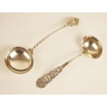 A Norwegian sterling silver ladle by T H Marthinsen, with scrolling foliate cast handle, 16.5cm