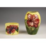 A Moorcroft Hibiscus pattern vase, 20th century, of baluster form, applied maker's label to base,