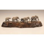 A Patrick Mavros (Zimbabwean, 21st century) silver model of an elephant family, the five elephants