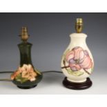 A Moorcroft Hibiscus pattern table lamp, 20th century, of squat shoulder baluster form, maker's mark