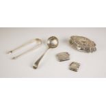 A selection of silver items, including a George III silver sugar sifter, George Smith and William