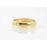 An 18ct yellow gold wedding band, stamped 'CG&S' Sheffield 1984, ring size U, 6.3gms