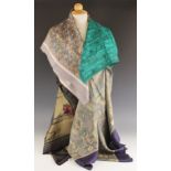 Four Liberty of London silk scarves, to include; a paisley pattern scarf in navy, green and brown