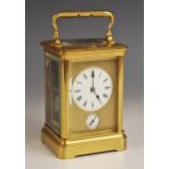 An early 20th century brass cased repeater carriage clock, with slow/fast indicator, 5cm enamelled