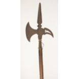 A Continental Sergeant’s Halberd, second half 17th century, on an early wooden haft, head length