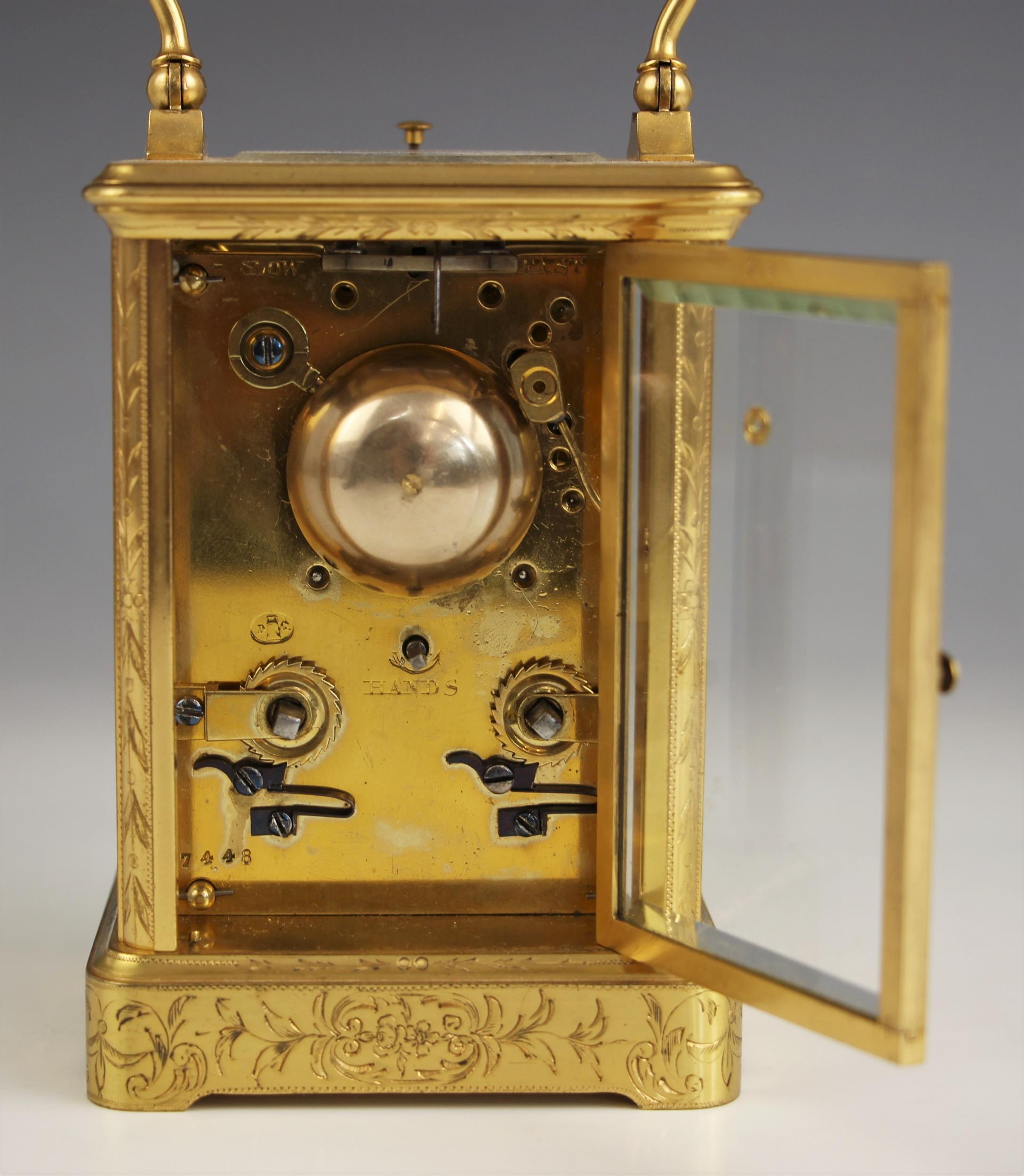 A brass cased repeater carriage clock, by Pierre Drocourt, late 19th century, the profusely chased - Image 3 of 4