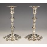 A pair of George II silver candlesticks, James Morison, London 1748, each with turned columns and