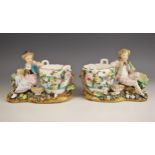 A pair of continental porcelain florally encrusted figural potpourris, 19th century, one modelled as