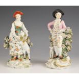 A near pair of Derby porcelain figures of a shepherd and shepherdess, c. 1760-65, the shepherd