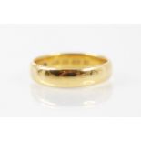 A 22ct yellow gold wedding band, stamped 'WWLd' London 1924, ring size O, 6gms