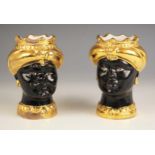 Two porcelain spill vases, 20th century, modelled as a male and female head in traditional gilt