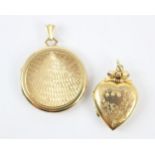 A 9ct yellow gold circular locket, the locket with engine turned detail to front and plain