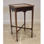 An Edwardian mahogany bijouterie table, the hinged square top inlaid with chequered stringing