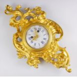 A Louis VXI style ormolu cased wall clock, late 19th century, the rococo style case cast with a