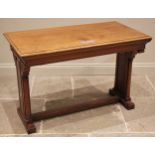A walnut altar/side table early 20th century, the rectangular top with a moulded edge applied with a