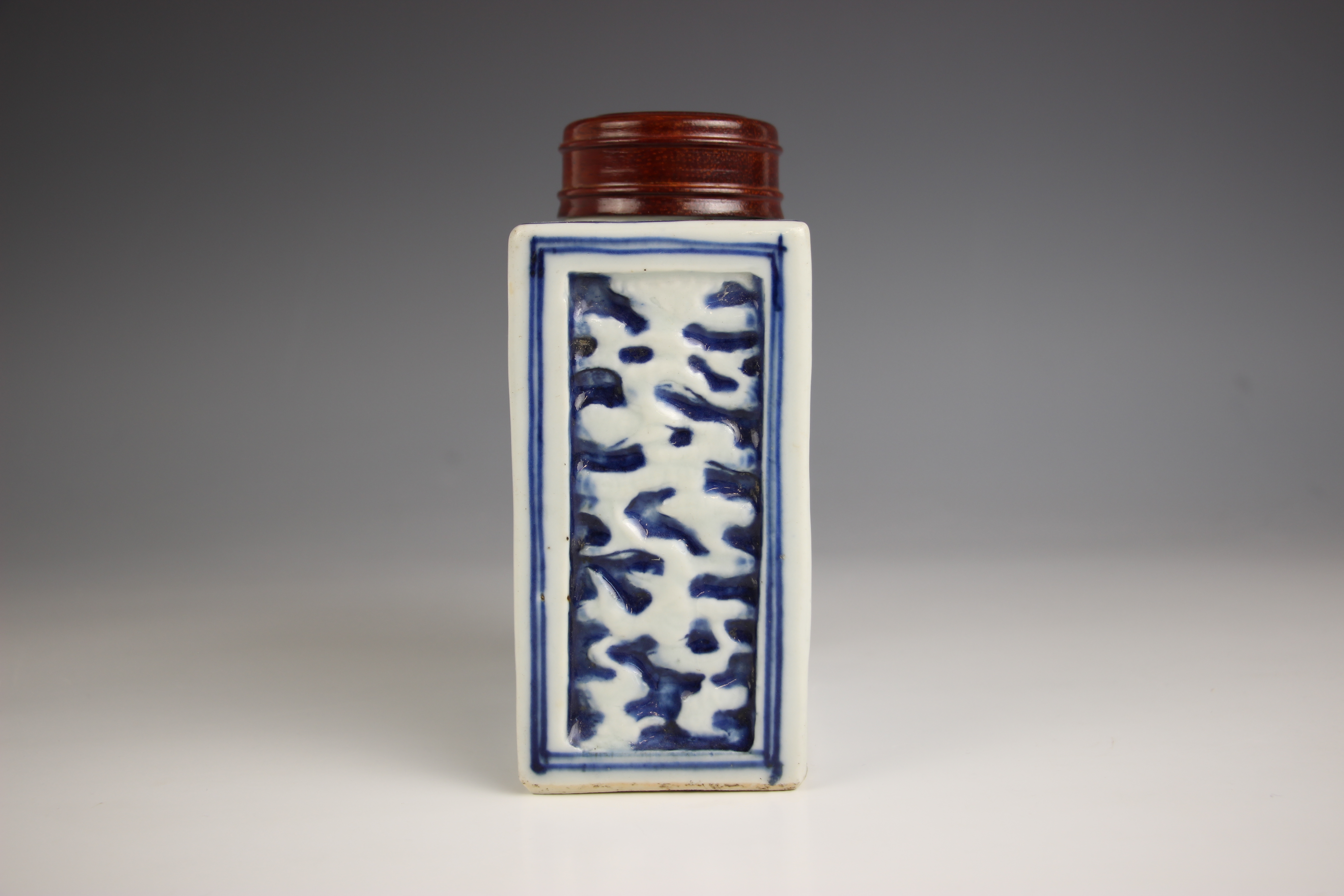 A Chinese porcelain blue and white tea caddy, 18th century, of rectangular form and relief decorated - Image 6 of 7