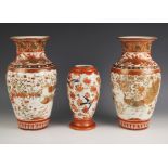 A pair of Japanese Kutani porcelain vases, Meiji period (1868-1912), each decorated with two