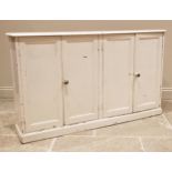 A Victorian painted pine kitchen/scullery cupboard, the rectangular moulded top with rounded front