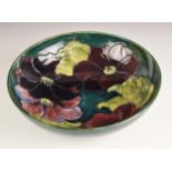 A Moorcroft bowl in the Clematis pattern, mid 20th century, painted Walter Moorcroft monogram,
