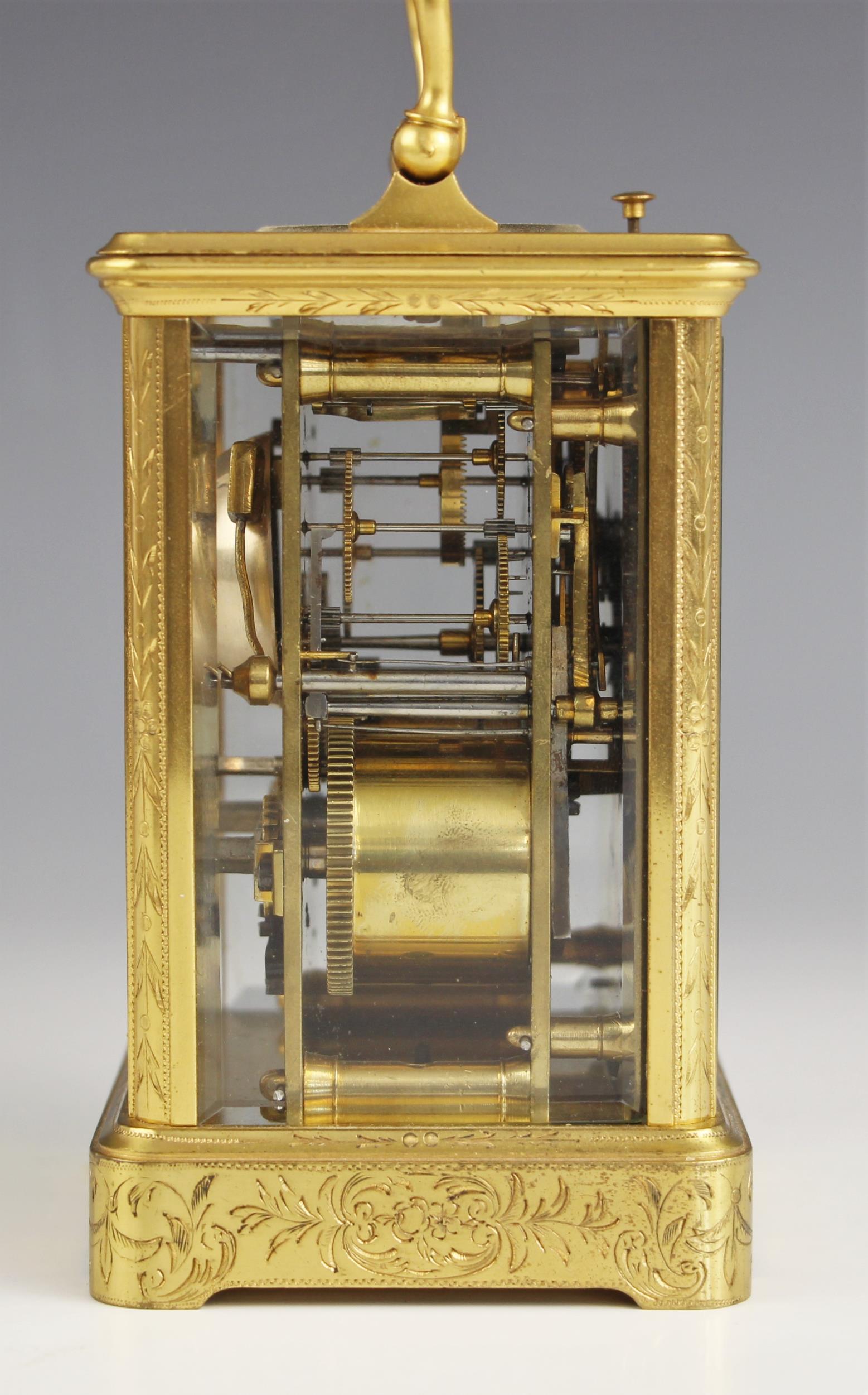 A brass cased repeater carriage clock, by Pierre Drocourt, late 19th century, the profusely chased - Image 2 of 4