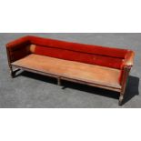 An oak and upholstered billiard room settle/sofa, early 20th century, the twin roll low back and