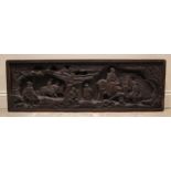 An 18th century carved panel, carved in deep relief depicting 16th century figures on horseback