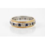 An untested sapphire and paste eternity ring, the calibre cut sapphires interspersed with round