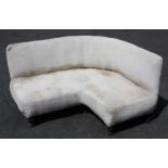 A contemporary corner sofa, 20th century, of curved 'C' form, upon painted vase shaped legs, 68cm