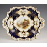 A Coalport two handled porcelain bon bon dish, late 19th/early 20th century, enamelled with an