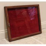 An oak framed table top display cabinet, early 20th century, the glazed rectangular case with a