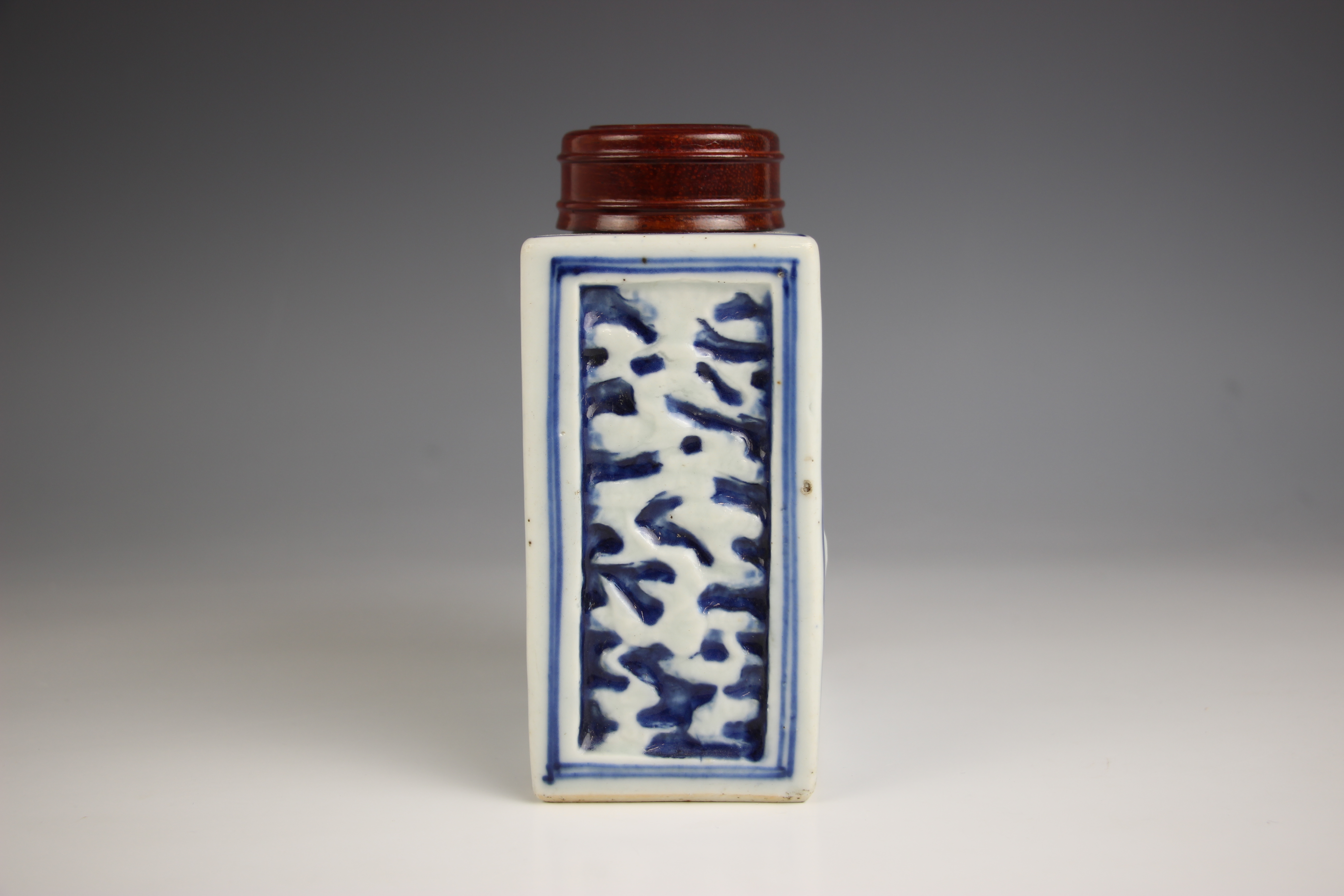 A Chinese porcelain blue and white tea caddy, 18th century, of rectangular form and relief decorated - Image 4 of 7