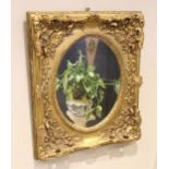 A Louis XVI style giltwood and composite wall mirror, late 20th century, the rectangular frame