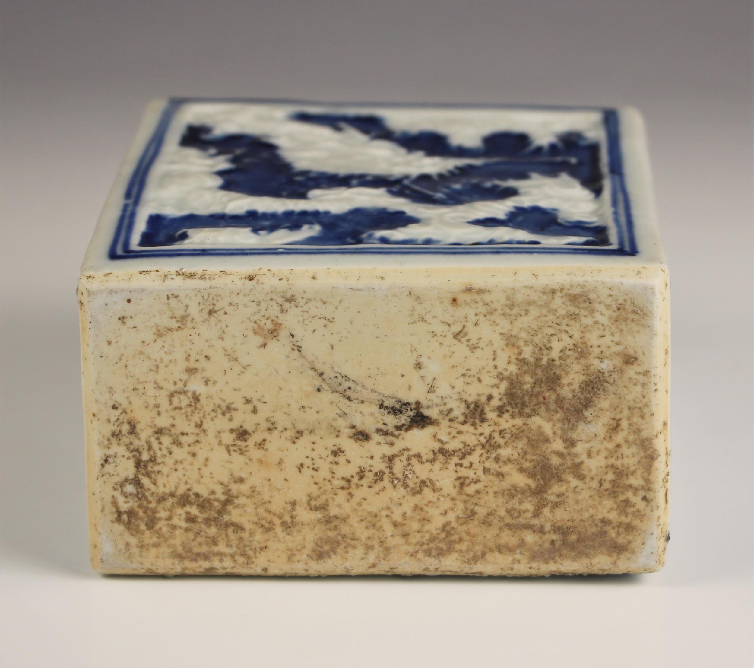 A Chinese porcelain blue and white tea caddy, 18th century, of rectangular form and relief decorated - Image 2 of 7